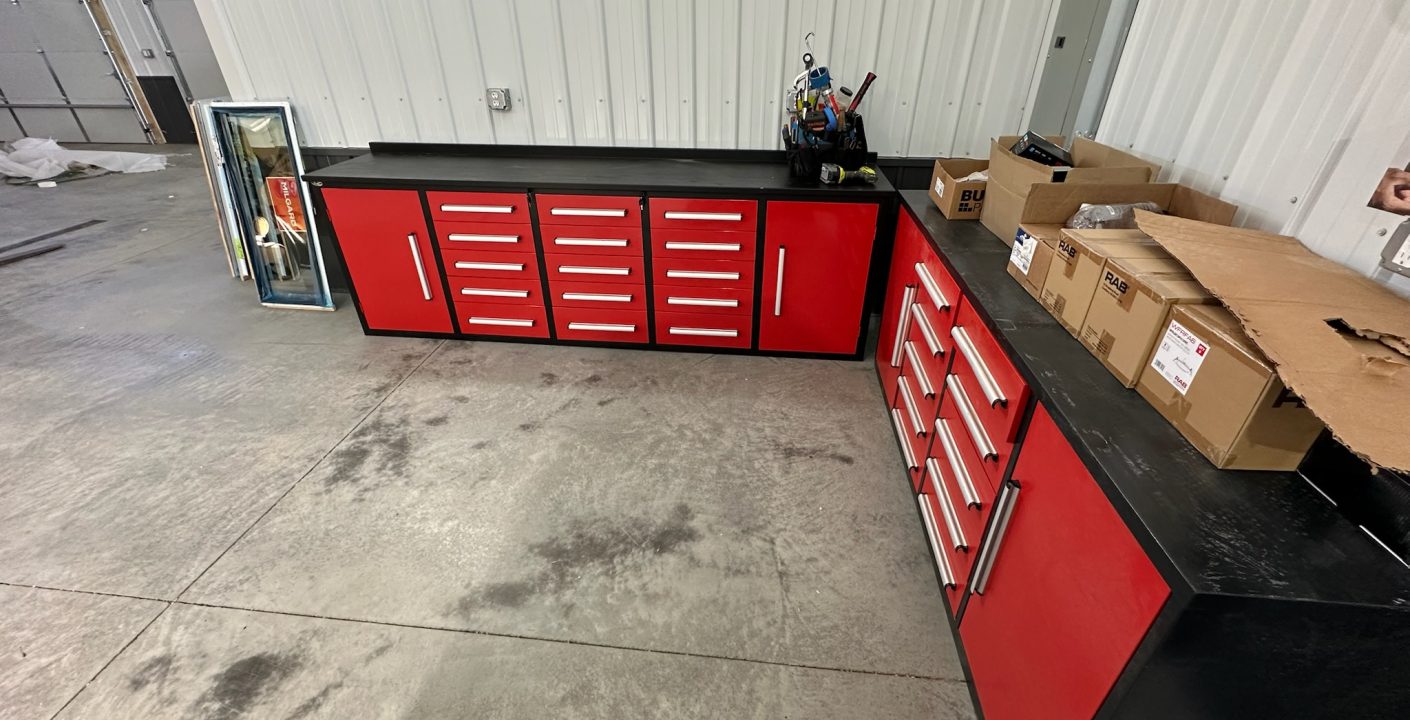 red and black cabinetry in shop world unit