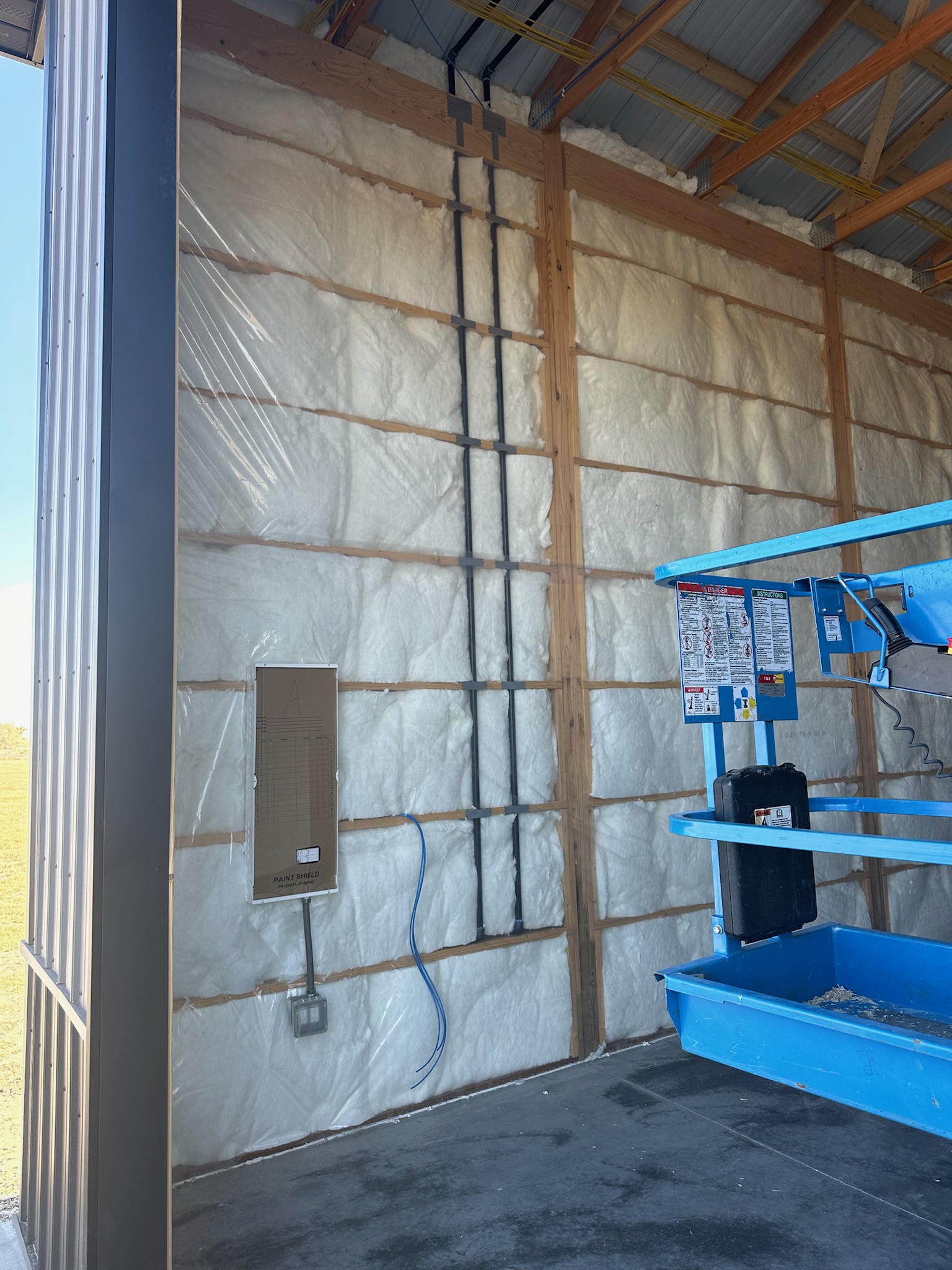insulation and breaker box inside shop unit