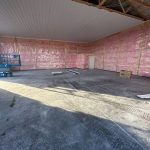 insulation and ceiling being installed in shop